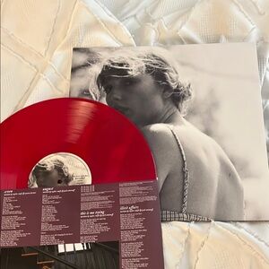 Red Vinyl Record with Black and White Album Cover